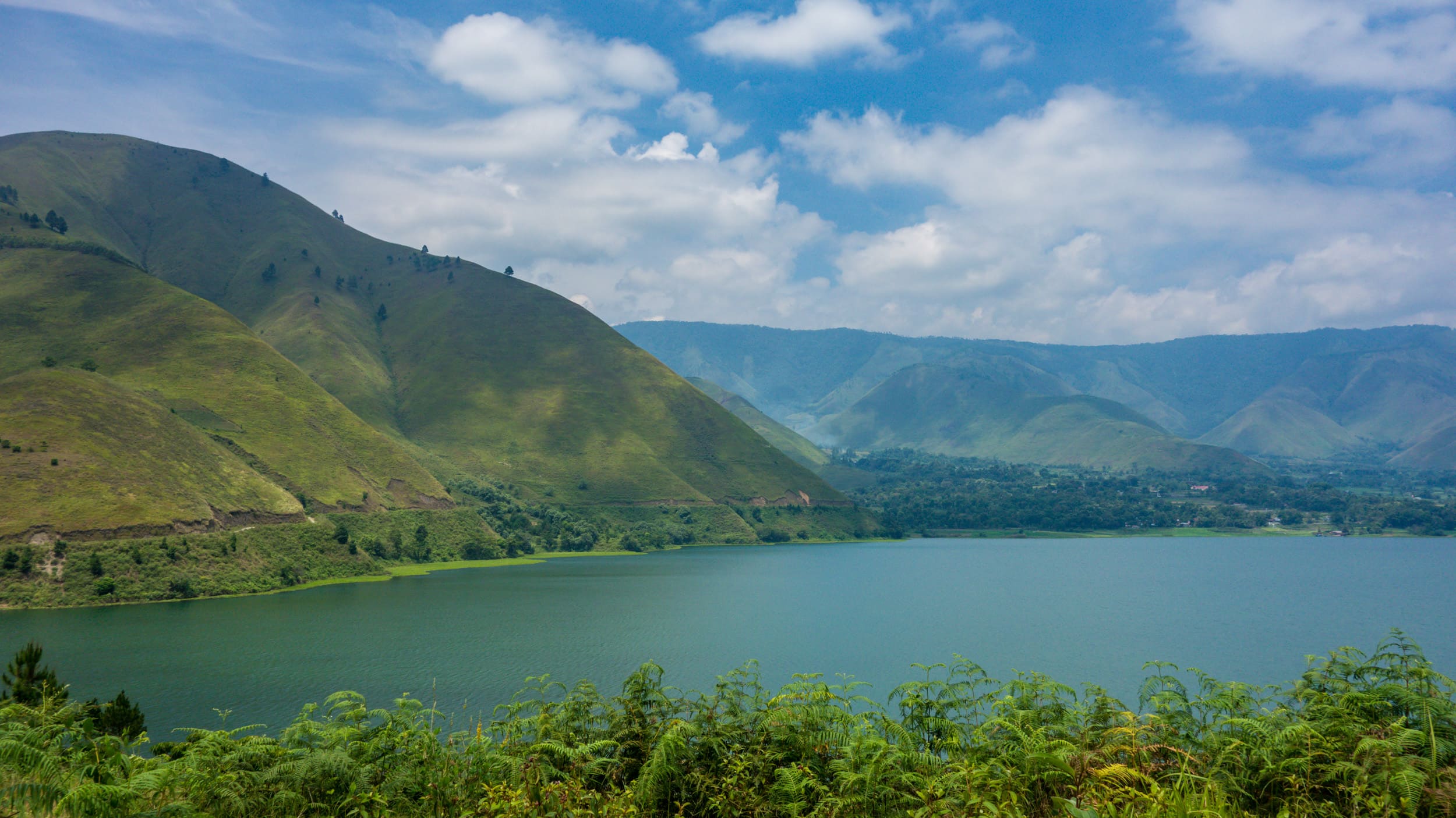 Menikmati Keindahan Sunrise dan Sunset di Danau Toba